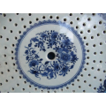 a Chinese blue and white porcelain strainer